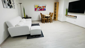 Harste Ferienhaus Ozga mit Balkon und Garten